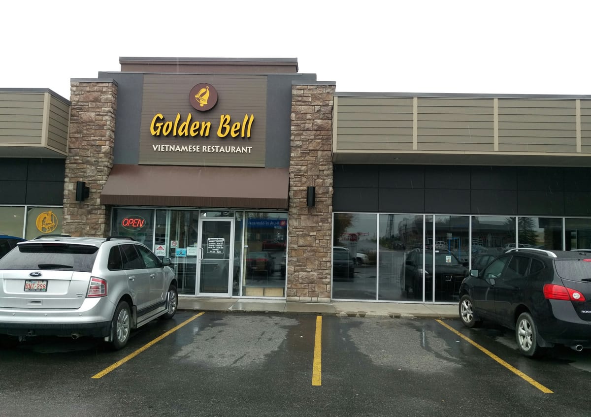 The Golden Bell Vietnamese Restaurant storefront and sign in London Place West Mall